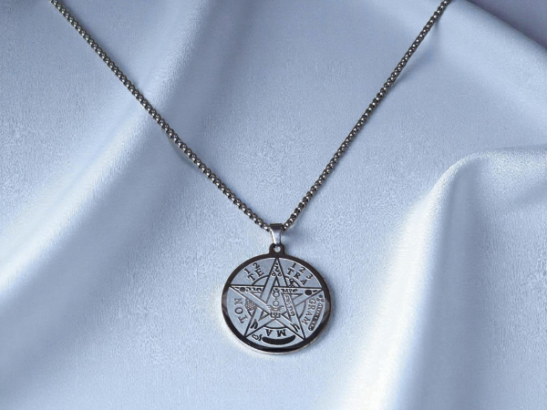 collier TELEGRAMMATON doré acier inoxydable