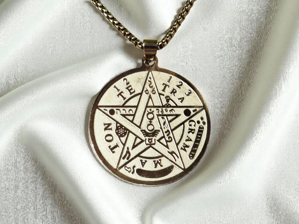 collier TELEGRAMMATON doré acier inoxydable